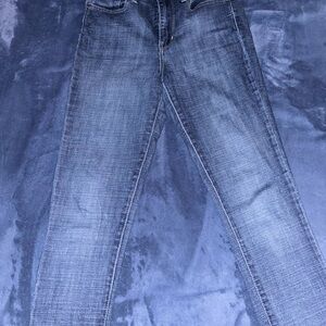 Levi's Women's Straight Leg high rise skinny Jeans in Dark Blue.